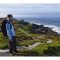 A walker admiring the wonderful views at Malin Head in County Donegal.