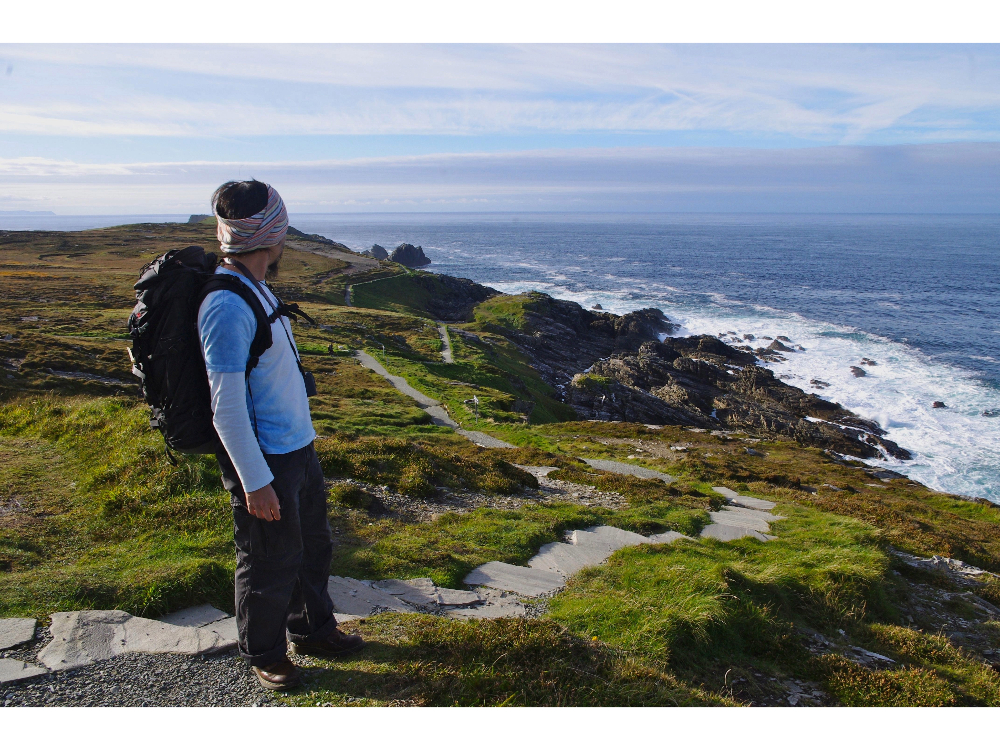 A walker admiring the wonderful views at Malin Head in County Donegal.